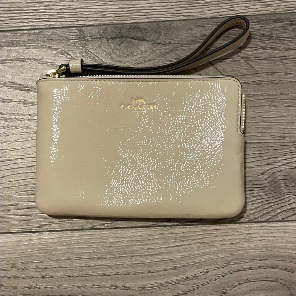 Coach Glossy Beige Wristlet